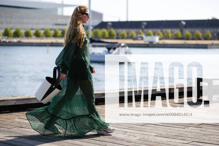 A chic showgoer attending the Munthe runway show during Copenhagen Fashion Week - Aug 9, 2018 - CPHFW: Spring 2019 Street Style Day 3, Copenhagen Denmark