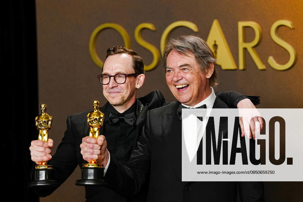 Chris Lavis and Maciek Szczerbowski celebrate in the press photo room after winning the Best Animated Short Film Oscar for The Girl Who Cried Pearls during the 98th annual Academy Awards in the Hollywood section of Los Angeles on Sunday, March 15, 2026. Conan O Brien is hosting the Oscars for the second consecutive year. LAP202603152305 BONNIExCASH