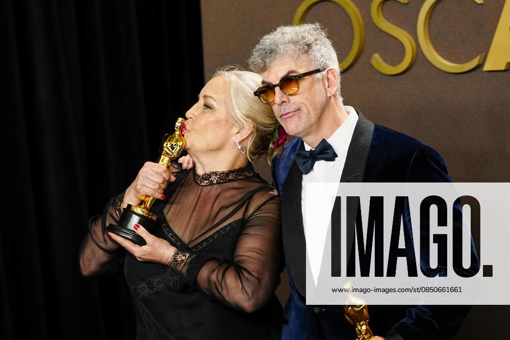 Tamara Deverell and Shane Vieau celebrate in the press photo room after winning the Best Production Design Oscar for Frankenstein during the 98th annual Academy Awards in the Hollywood section of Los Angeles on Sunday, March 15, 2026. LAP20260315363 BONNIExCASH