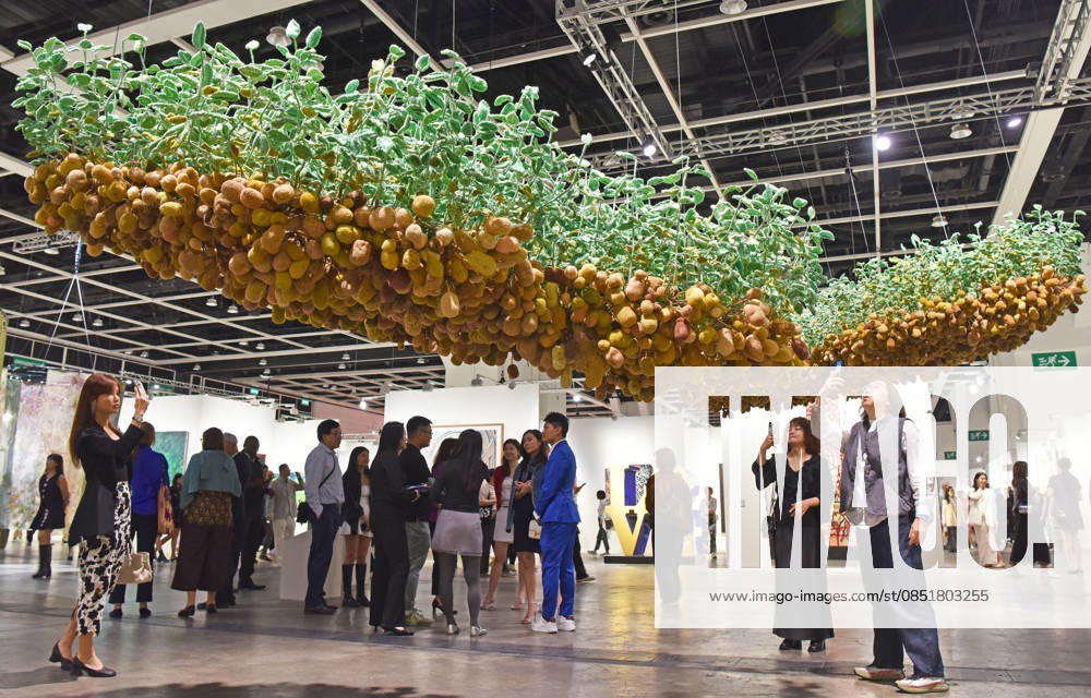 (260326) -- HONG KONG, March 26, 2026 -- Visitors view exhibits at the preview of Art Basel Hong Kong 2026 at the Hong Kong Convention and Exhibition Center in south China s Hong Kong, March 25, 2026. Art Basel Hong Kong 2026 held its preview here on Wednesday, bringing together 240 galleries from 41 countries and regions. Featuring six themed sectors and programs, the fair will open to the public from Friday to Sunday. ) CHINA-HONG KONG-ART BASEL-PREVIEW (CN) ChenxDuo