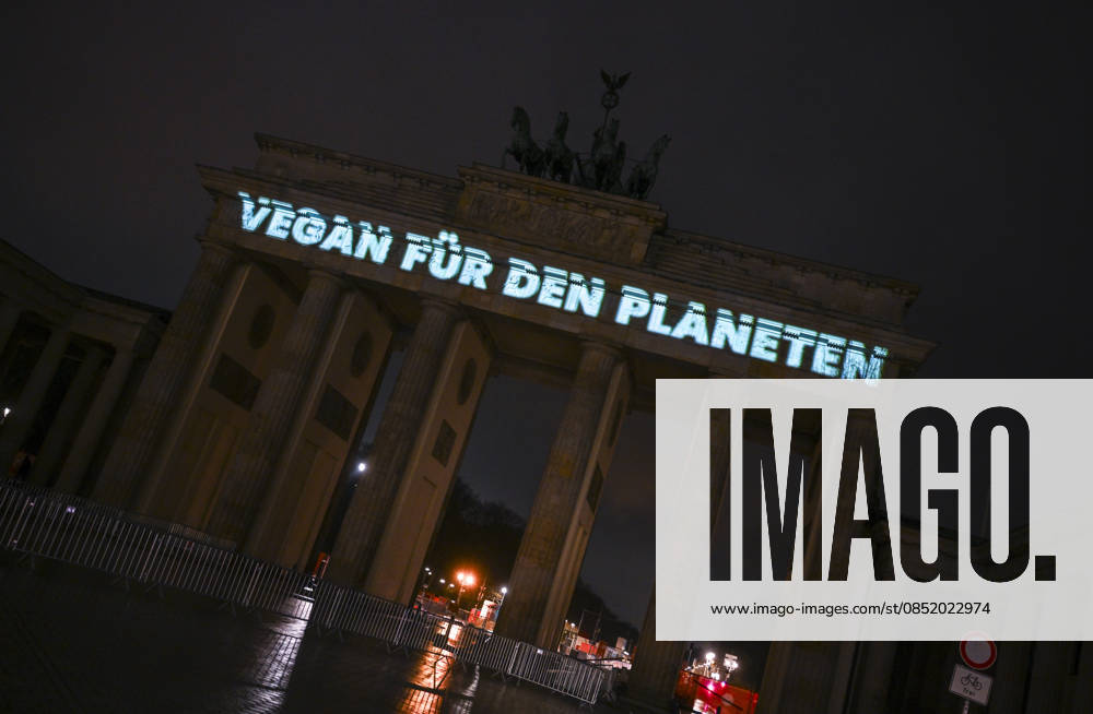 Brandenburg Gate lights switched off in Berlin for Earth Hour BERLIN, GERMANY - MARCH 28: A projection reading Vegan for the Planet is displayed on the Brandenburg Gate as its lights are switched off during the Earth Hour event organized by the World Wide Fund for Nature to raise awareness about global climate change, while environmental activists gather in Berlin, Germany, on March 28, 2026. Halil Sagirkaya Anadolu Berlin Germany. Editorial use only. Please get in touch for any other usage.