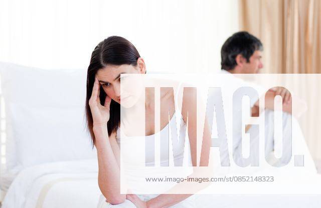 Angry couple having an argument sitting on bed Angry couple having an argument sitting on bed at home, model released, Cape Town, South Africa, 17.10.2009, 38589.jpg, bed, wife, home, glum, riled, vexed, irate, morbid, gloomy, dismal, ireful, lovers, bitter, couple, divorce, married, unhappy, annoyed, husband, bedroom, indoors, offended, troubled, mournful, argument, bereaved, affronted, depressed, boyfriend, irascible, irritable, resentful, interiors, despairing, despondent, melancholy, distressed, infuriated, girlfriend, displeased, exasperated, exacerbated, pessimistic, relationship, lowspirited, heterosexual, disconsolate 30s, Mid Adult, Man, Male, Caucasian, 20s, Young Adult, Woman, Female, Caucasian Appearance, 35-39 Years, Mid Adul
