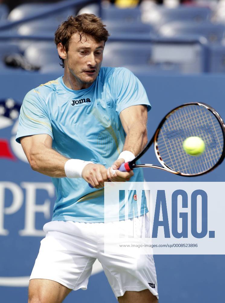 Juan Carlos Ferrero of Spain hits a backhand on day 8 in Louis Armstrong Stadium at the U.S. Open Tennis Championships at the Billie Jean King National Tennis Center in New York City on September 5, 2011. NYP20110905108