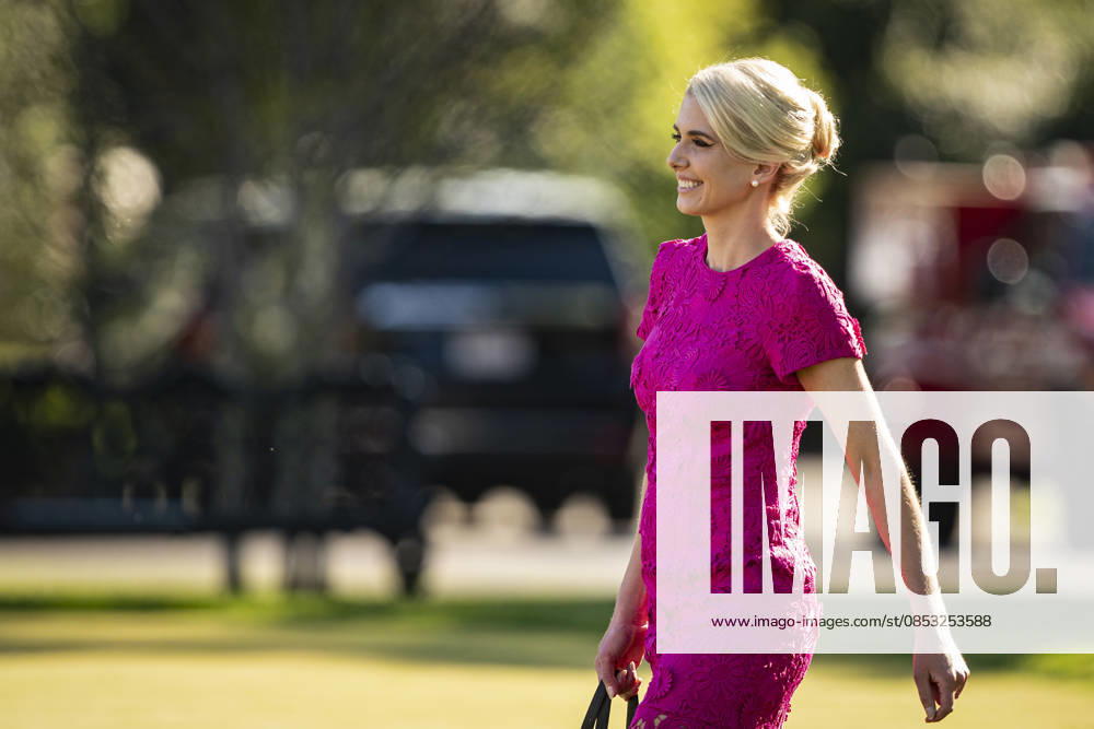 Natalie Harp, executive assistant to US President Donald Trump, walks behind President Donald Trump to Marine One on the South Lawn of the White House, on Friday, April 10, 2026 in Washington, DC. President Donald Trump is traveling to his winery in Charlottesville, Virginia Washington USA - ZUMAs152 20260410_faa_s152_030