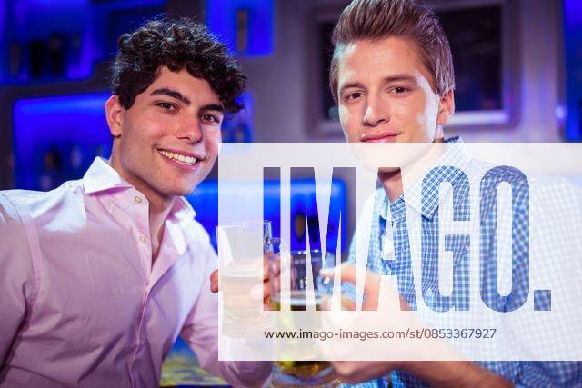 Portrait of smiling friends enjoying alcohol Portrait of smiling men enjoying alcohol at nightlcub, model released, , property released, Prague, Czech Republic, 07.04.2016, 773950.jpg, looking, lifestyle, leisure, casual clothing, party, celebration, fun, clubbing, event, stylish, bar, pub, nightclub, nightlife, drunk, disco, youth culture, club, youthful, beer, beer glass, glass, alcohol, cool, entertainment, bar counter, drink, holding, refreshment, freshness, food and drink, enjoying, entertainment club, bonding, friends, socializing, together, friendship, weekend, drinking, smiling, happiness, happy hour, meeting up Indoors,Front view,Portrait,Looking at camera,Head and shoulders