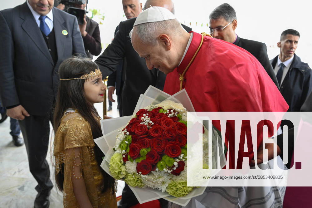 Pope Leo XIV Apostolic Visit To Algeria Pope Leo XIV is welcomed by a young girl with flowers as he arrives in Algiers, Algeria on April 13, 2026. The pope begins his third and longest-yet Apostolic Journey, which takes him to four countries on the African continent: Algeria, Cameroon, Angola, and Equatorial Guinea. Photo by (EV) Simone Risoluti Vatican Media ABACAPRESS.COM Algiers Algeria