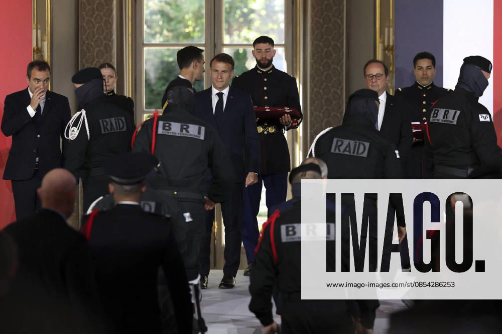 Sébastien Lecornu, Prime Minister, Emmanuel Macron, President of the French Republic, François Hollande Ceremony to award collective decorations to the police officers who intervened in the Bataclan concert hall on November 13, 2015 s attacks, at the Elysee Palace in Paris, on April 21, 2026 France s President, Emmanuel Macron decorates police officers after awarding them during a ceremony to honour the police officers who intervened in the Bataclan concert hall on November 13, 2015 s attacks, at the Elysee Palace in Paris, on April 21, 2026 Paris France