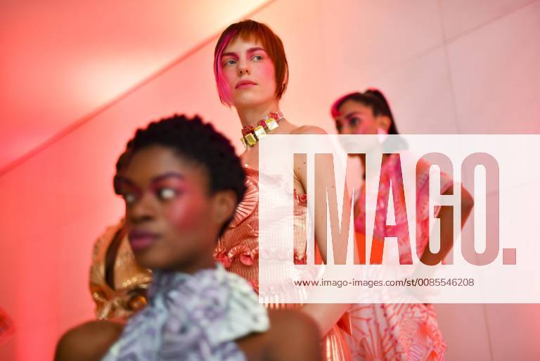 London, United Kingdom - Models pose for photographs at Zandra Rhodes presentation during London Fashion Week September 2018, London on September 18, 2018. London United Kingdom - ZUMAn230 20180918_zaa_n230_616