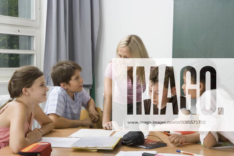 Teacher with her students