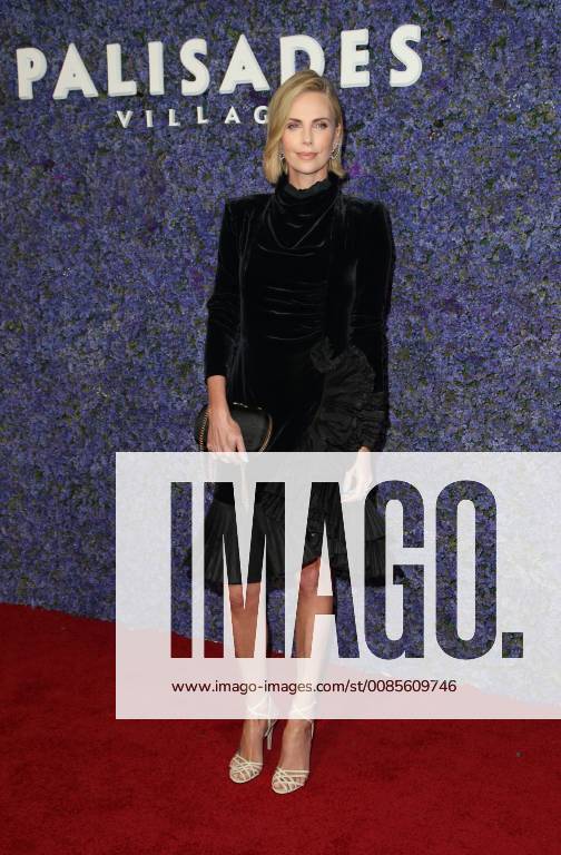 PACIFIC PALISADES, CA - SEPTEMBER 20 : Charlize Theron, at Caruso s Palisades Village Opening Gala in Palisades, California on September 20, 2018.