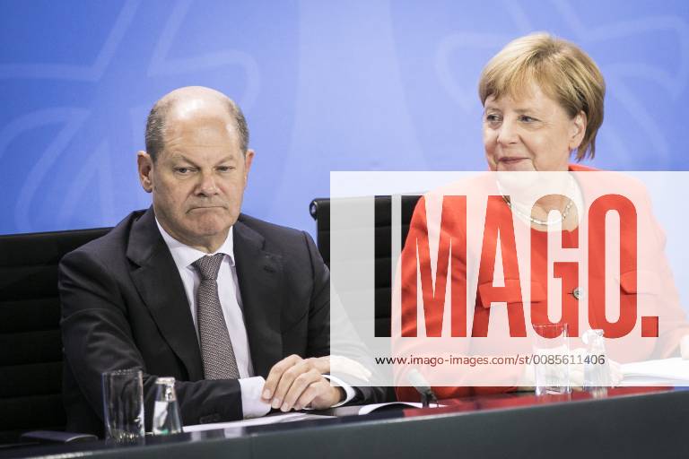 Bundesfinanzminister Olaf Scholz (L), SPD, und Bundeskanzlerin Angela Merkel, CDU, aufgenommen im Rahmen einer Pressekonferenz nach dem Wohngipfel im Bundeskanzleramt. Berlin, 21.09.2018. Berlin Deutschland
