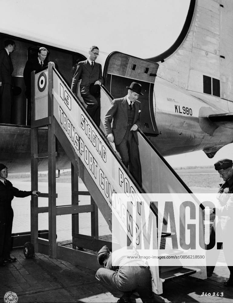 Foreign Minister Anthony Eden at Berlin airfield, Germany, 1945 British Foreign Minister Anthony Eden arriving at Berlin-Gatow airfield, Berlin, Germany, 15 Jul 1945 Editorial use only. All other uses to be cleared with the copyright owner (World History Archive), in advance., WHA_059_0052.jpg, British Foreign Minister; Anthony Eden; Berlin-Gatow airfield; Berlin; Germany; 1945; July; arrival; politician; historical; event; World War II; post-war; Europe; British delegation; diplomatic visit; official trip; government official; British history; Berlin Airlift; British politics; international relations; 20th century; black and white; vintage; archival; Anthony Eden in Berlin; British diplomat; wartime; British governme