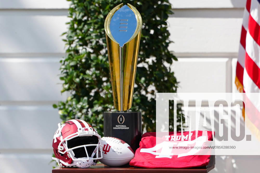 The National Championship trophy and a jersey with United States President Donald J Trumps name on it, sit on a table during an event hosting the 2026 National Football Champion Indiana University on the South Lawn of the White House in Washington, DC, USA, on Monday, May 11, 2026 Washington USA - ZUMAs152 20260511_faa_s152_070
