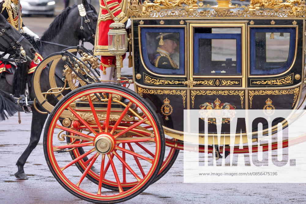 London, UK. KING CHARLES III and QUEEN CAMILLA depart Buckingham Palace in the Diamond Jubilee State Coach to House of Lords in Westminster in London for The State Opening of Parliament and The Kingâ€⠢s Speech. The Kingâ€⠢s Speech marks the formal start of the parliamentary year and sets out the government s agenda for the 2026-27 session. London UK - ZUMAl94_ 20260513_zaf_l94_037