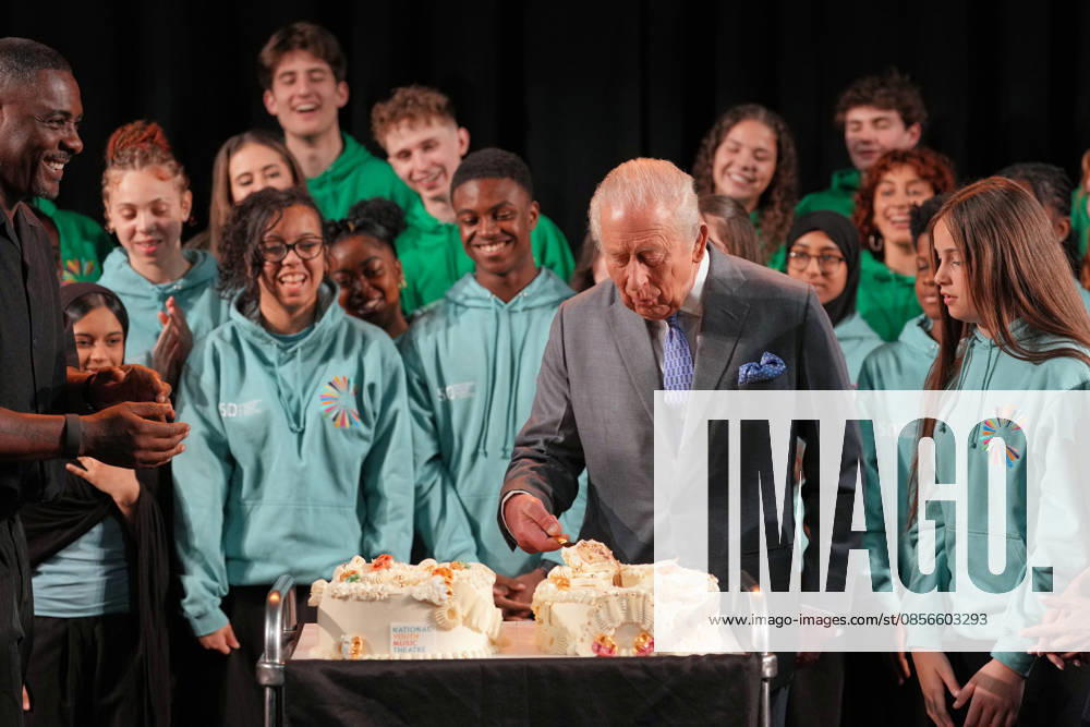 Britain Royals Britain s King Charles III serves cake as he joins English actor Idris Elba in meeting students taking part in workshops organised by National Youth Music Theatre (NYMT) at The Other Palace in London, Thursday, May 14, 2026., Credit:Avalon.red PA ROTA - B68 Avalon GBR, London