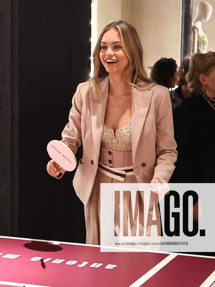 IPA84680175 - Rome, Laila Hasanovic attends the Antonio Marras boutique event. Pictured: Laila Hasanovic plays ping pong.