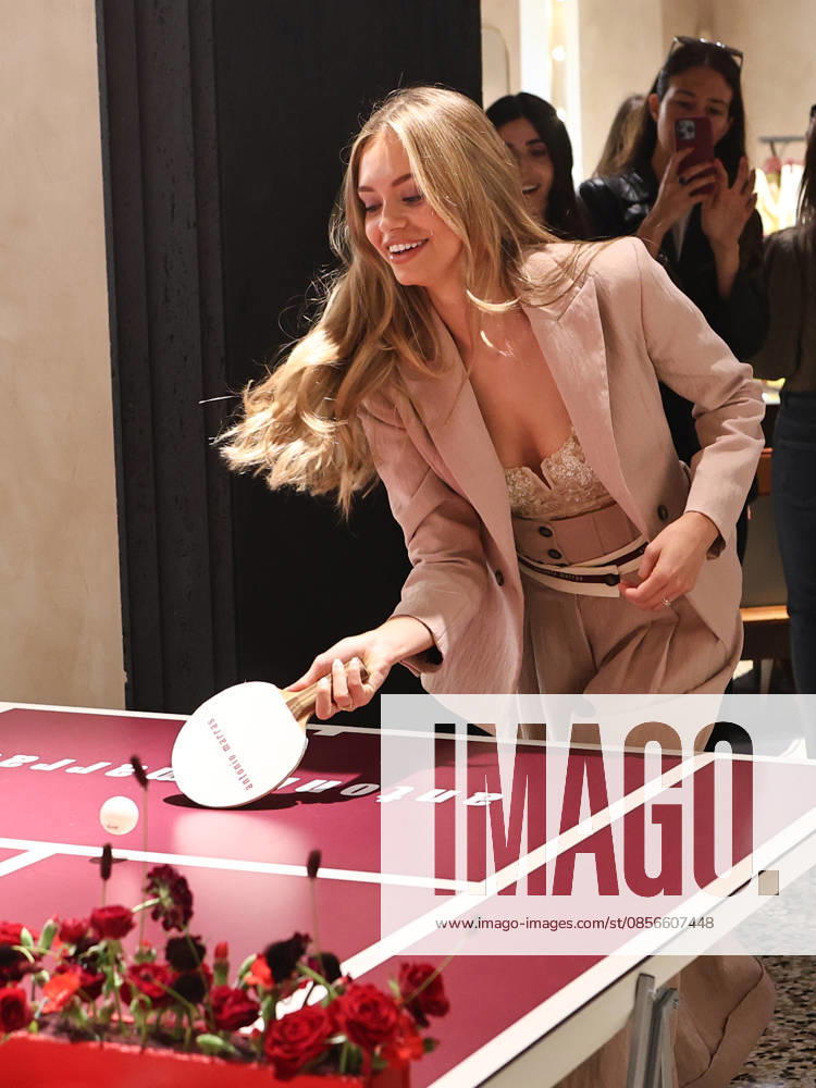 IPA84680126 - Rome, Laila Hasanovic attends the Antonio Marras boutique event. Pictured: Laila Hasanovic plays ping pong.