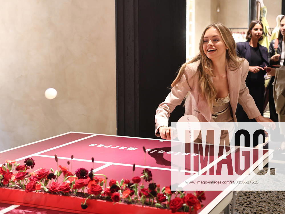 IPA84680184 - Rome, Laila Hasanovic attends the Antonio Marras boutique event. Pictured: Laila Hasanovic plays ping pong.