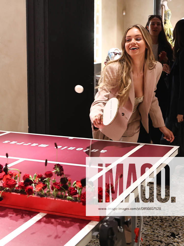 IPA84680188 - Rome, Laila Hasanovic attends the Antonio Marras boutique event. Pictured: Laila Hasanovic plays ping pong.
