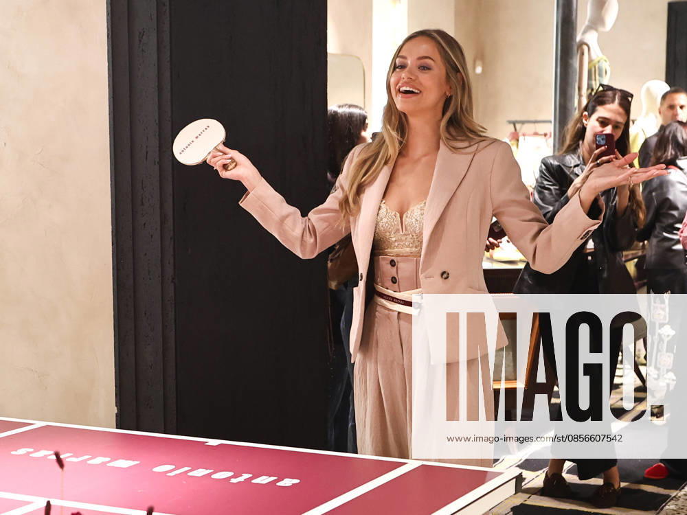 IPA84680200 - Rome, Laila Hasanovic attends the Antonio Marras boutique event. Pictured: Laila Hasanovic plays ping pong.