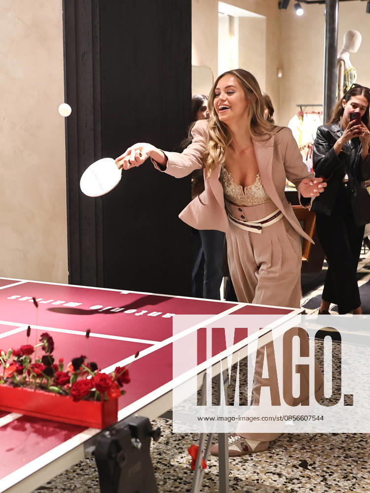 IPA84680202 - Rome, Laila Hasanovic attends the Antonio Marras boutique event. Pictured: Laila Hasanovic plays ping pong.