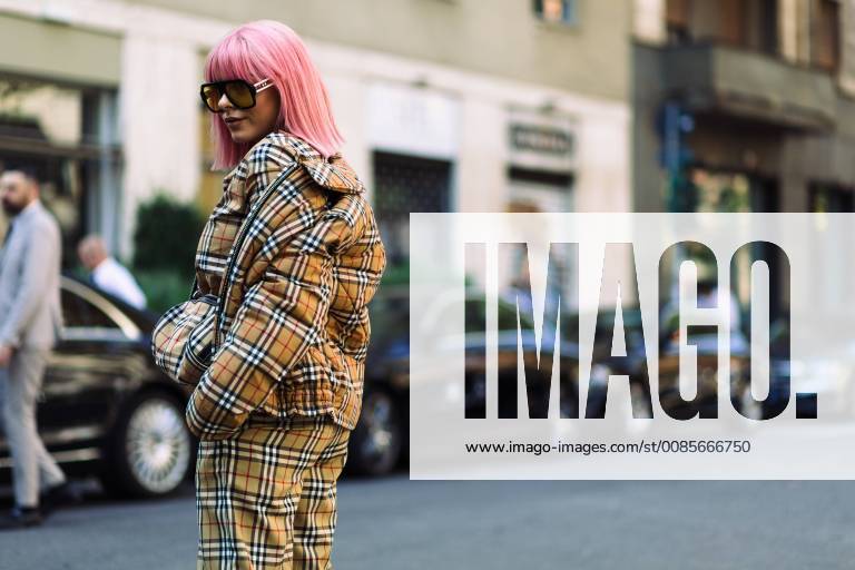 A chic showgoer posing outside the Dolce & Gabbana runway show during Milan Fashion Week - Sept 23, 2018 - MFW: Spring 2019 Street Style Day 5, Milan Italy