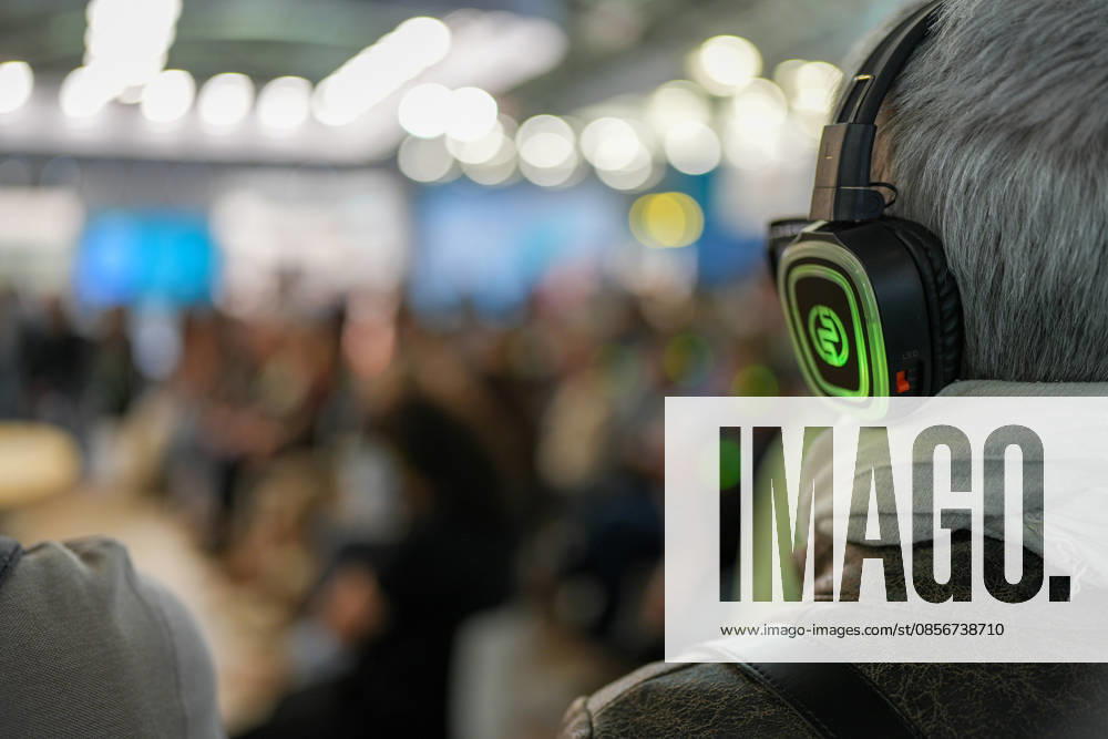 IPA84723879 - Turin. Second day of the 18th edition of the Turin International Book Fair entitled The World Saved by Kids. The fair will remain open from May 14 to 18, 2026 at Lingotto Fiere Pictured: audience listens to audiobooks