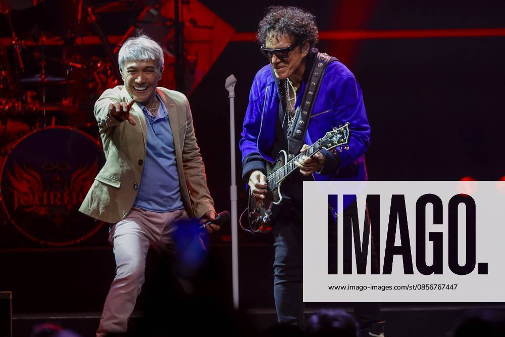 Lead singer Arnel Pineda and guitarist Neal Schon of the band Journey performs on stage during the 2026 Final Frontier Tour at Benchmark International Arena on Friday, May 15, 2026 in Tampa. Tampa USA - ZUMAs70_ 20260515_zan_s70_022