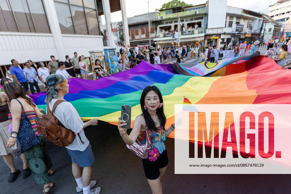 The Chiang Mai Pride Parade 2026 celebrations in Chiang Mai, Thailand - 24 May 2026 A participant holds a rainbow flag and takes a selfie during The Chiang Mai Pride Parade 2026 celebrations. The Chiang Mai Pride Parade 2026 took place in Chiang Mai, Thailand. Chiang Mai province holds Thailandís first Pride Month celebrations annually, promoting gender equality, diversity, and human rights as part of Pride Month activities in northern Thailand. Chiang Mai Thailand