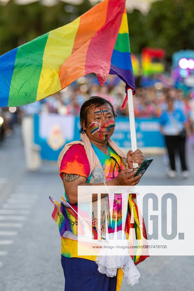 A participant dressed in colorful clothing carries a rainbow flag during The Chiang Mai Pride Parade 2026 during celebrations. The Chiang Mai Pride Parade 2026 took place in Chiang Mai, Thailand. Chiang Mai province holds Thailandis first Pride Month celebrations annually, promoting gender equality, diversity, and human rights as part of Pride Month activities in northern Thailand. Chiang Mai Thailand - ZUMAs197 20260524_aaa_s197_113