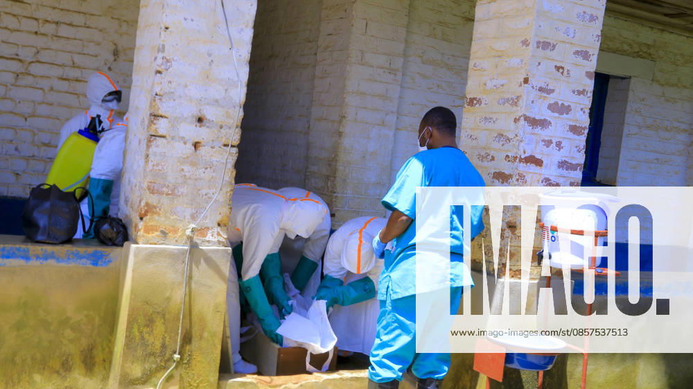 Ebola outbreak in Democratic Republic of Congo MONGBWALU, DEMOCRATIC REPUBLIC OF THE CONGO - MAY 25: Health workers wearing protective equipment transport the body of a person who died with suspected Ebola infection to the General Referral Hospital for burial procedures in Mongbwalu of Ituri province in eastern Democratic Republic of the Congo, on May 25, 2026. Marcus Loika Anadolu Mongbwalu Democratic Republic of the Congo. Editorial use only. Please get in touch for any other usage.