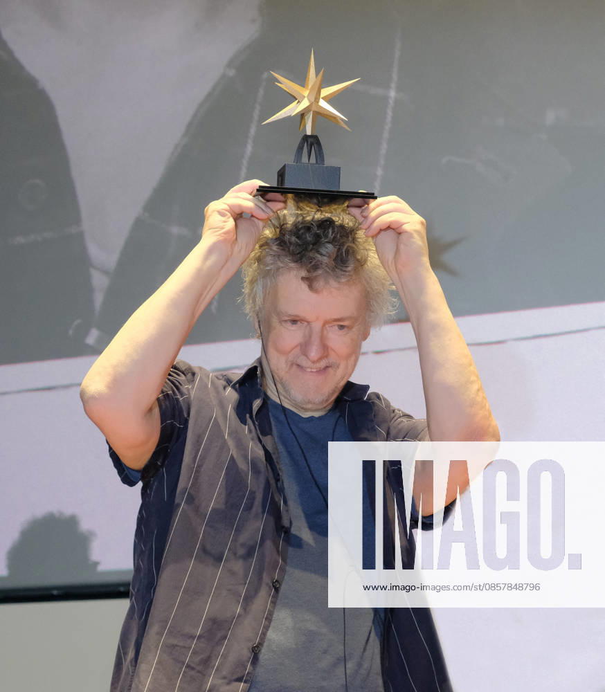 Michel Gondry At Stella Della Mole Award Ceremony - Turin French director Michel Gondry receives the Stella della Mole award in recognition of his contribution to filmmaking during a ceremony at Cinema Massimo in Turin, Italy, on May 28, 2026 alongside National Cinema Museum director Carlo Chatrian, as he reviews his eclectic career and introduces the screening of Microbo&Gasolina. Photo by Costantino Sergi IPA ABACAPRESS.COM Torino Torino