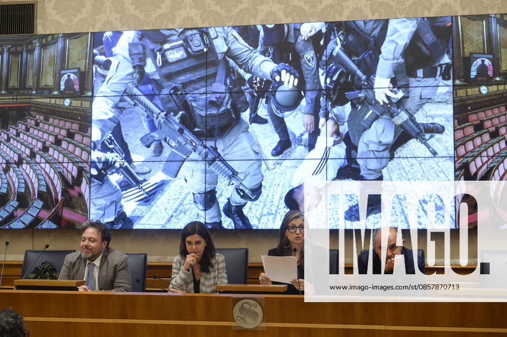 IPA85160339 - Rome Senate presentation of UN special rapporteur s report on the occupied Palestinian territories, pictured Dario Carotenuto Laura Boldrini Francesca Albanese Peppe De Cristofaro in the background pictures from Gaza