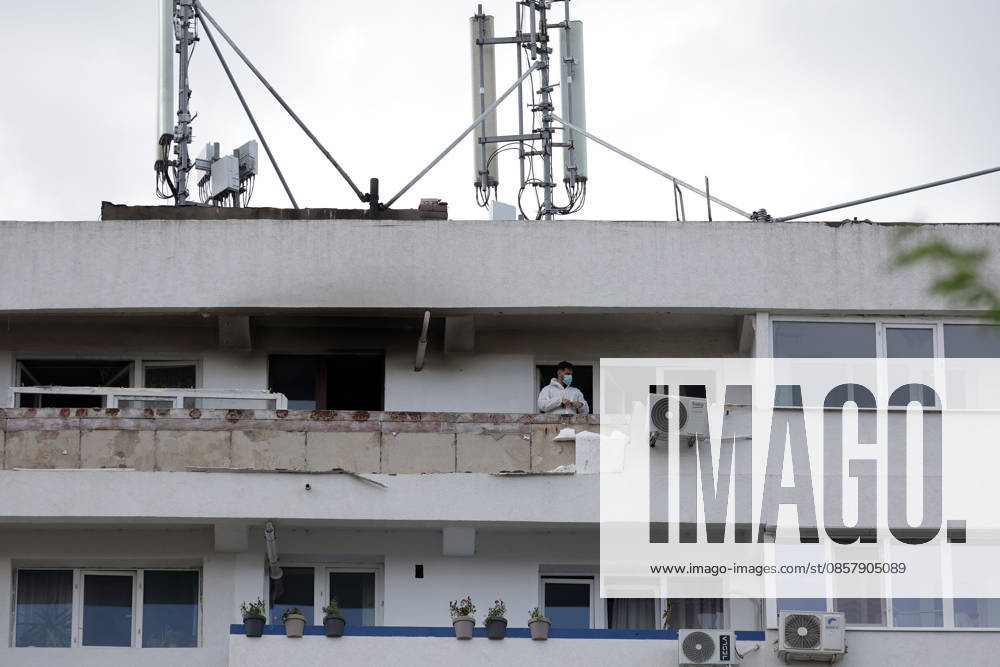 (260529) -- GALATI, May 29, 2026 -- A staff worker checks the residential apartment building damaged by a Russian drone in Galati, Romania, May 29, 2026. At least two people were injured after a drone struck a residential apartment building in Galati, Romania, near the border with Ukraine, local media reported Friday. (Photo by Xinhua) ROMANIA-GALATI-DRONE CristianxCristel