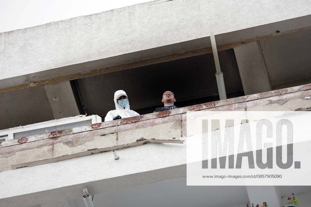 (260529) -- GALATI, May 29, 2026 -- Staff workers check the residential apartment building damaged by a Russian drone in Galati, Romania, May 29, 2026. At least two people were injured after a drone struck a residential apartment building in Galati, Romania, near the border with Ukraine, local media reported Friday. (Photo by Xinhua) ROMANIA-GALATI-DRONE CristianxCristel
