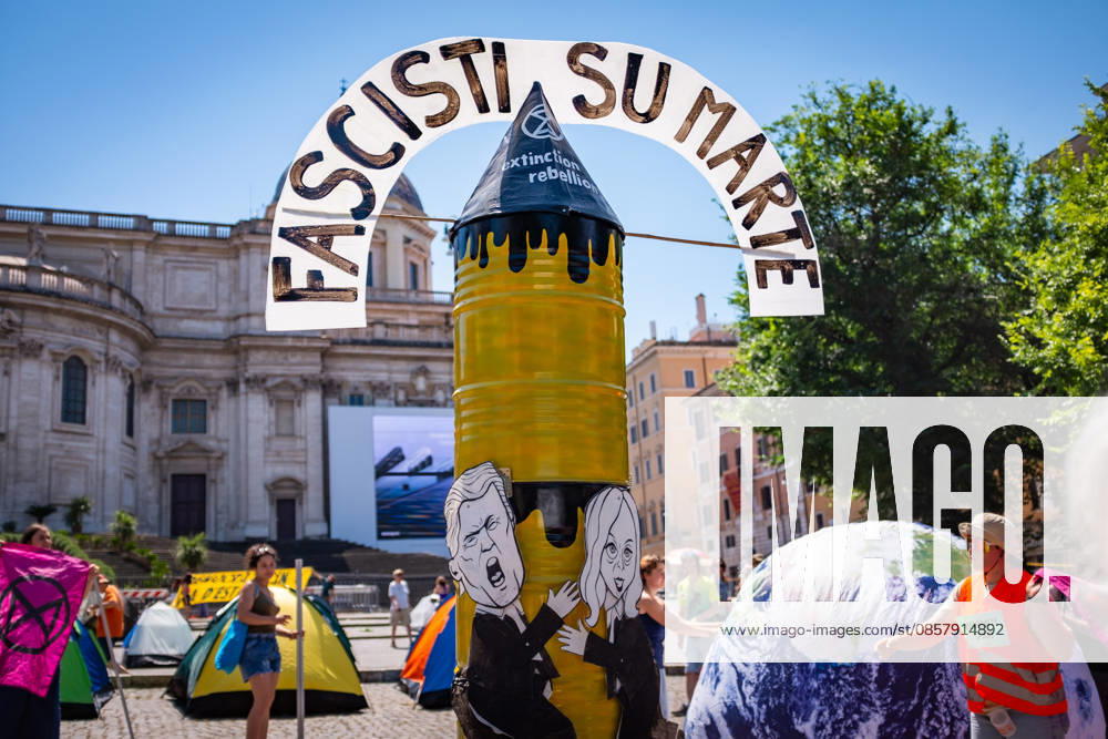 Extinction Rebellion activists are launching a 24-hour rally in Piazza dell Esquilino, just days before the 80th anniversary of the Italian Republic on June 2nd. They say: there is nothing to celebrate as long as rights, justice, and dignity continue to be denied. Oil extraction is imposed through violence and war to produce ever more energy, further increasing inequality. Activists pinned drawings of Donald Trump and Giorgia Meloni to a rocket made of oil drums. It reads: Fascists on Mars. Rome Italy - ZUMAg256 20260530_znp_g256_005