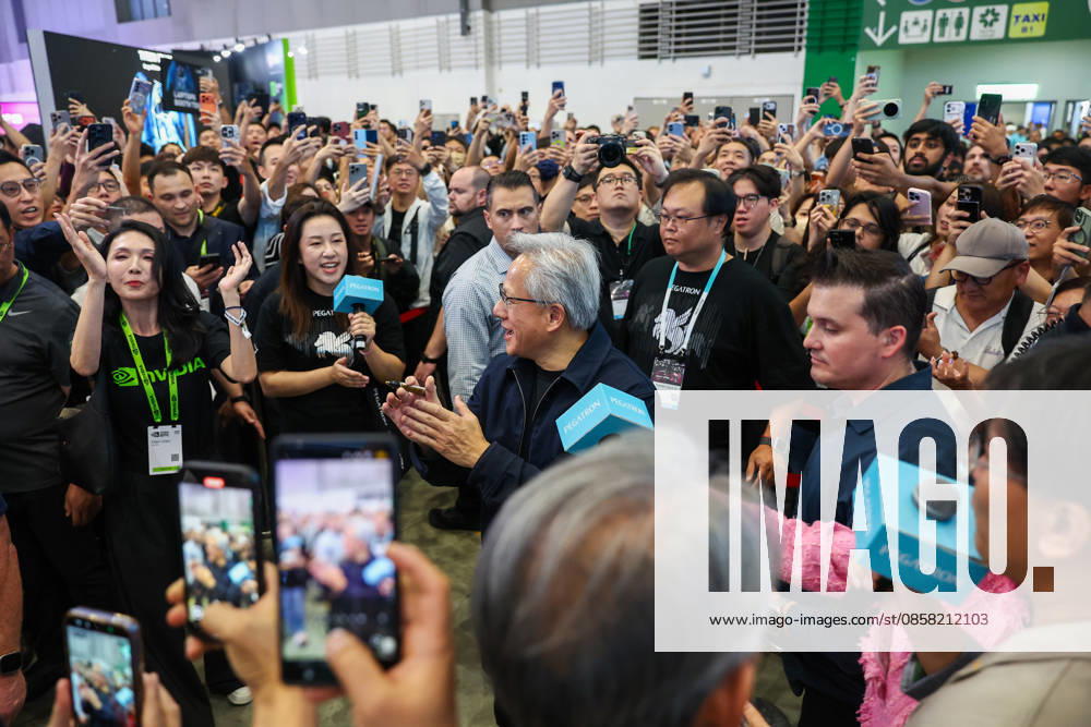 NVIDIA s CEO Jensen Huang visits COMPUTEX TAIPEI 2026 TAIPEI, TAIWAN - JUNE 3: Jensen Huang, the CEO of American multinational tech giant NVIDIA, applaud as he is surrounded by heaps of supporters and staff during his visit to the COMPUTEX TAIPEI trade show, in Taipei, Taiwan, on June 3, 2026. COMPUTEX TAIPEI is one of the world’s largest and most significant trade shows, featuring latest technologies, drones, data centres, Artificial Intelligence (AI) technologies, supercomputers, semiconductors products and other things from major international firms such as Nvidia, Intel, NXP and Foxconn. Daniel Ceng Anadolu Taipei Taiwan. Editorial use only. Please get in touch for any other usage.