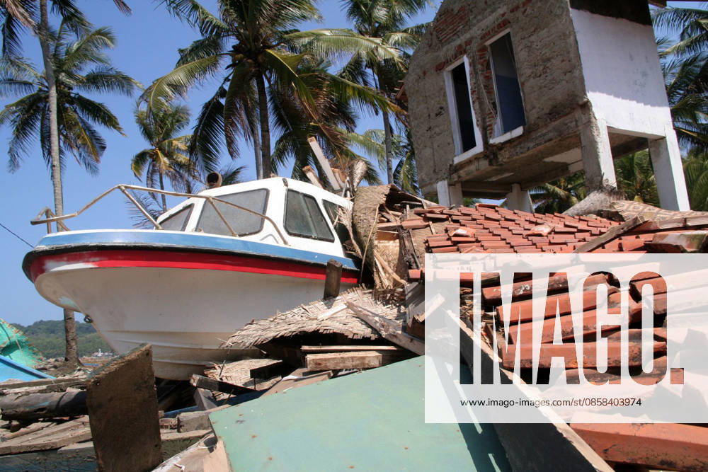 Over 500 Dead in Java Tsunami Jul 20, 2006; Ciamis, West Java, INDONESIA; A speedboat stranded on Pangandaran Beach. A tsunami hit the coast of the Indonesian island of Java killing more than 550 people, leaving over 600 injured. Over 38,000 others have been displaced by the disaster. An earthquake around 240km beneath the ocean floor caused the giant black wave to sweep 300m inland, destroying homes, hotels and people. Mandatory Credit: Photo by Toto Santiko Budi JiwaFoto ZUMA Press. ( ) Copyright 2006 by JiwaFoto Ciamis West Java INDONESIA