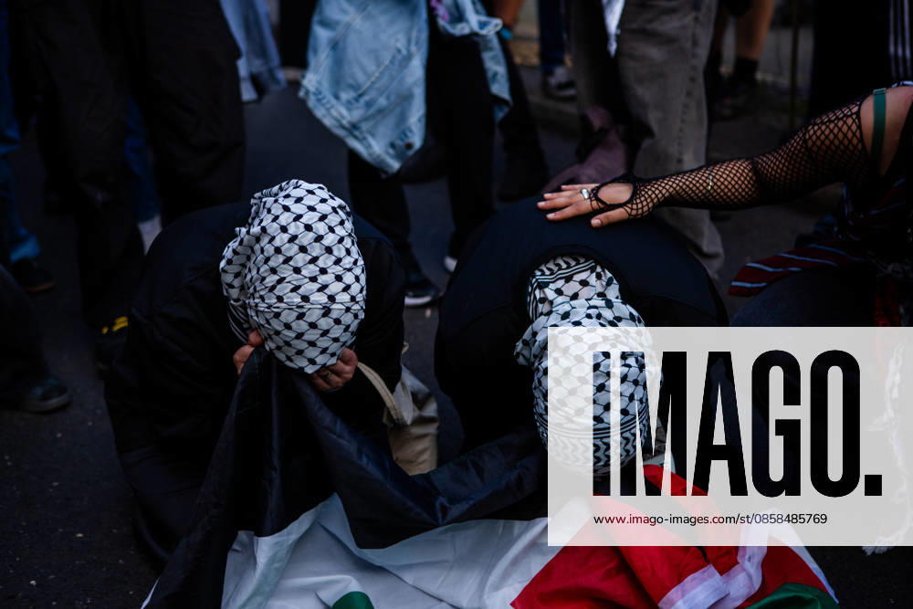 Two Palestinian demonstrators break down in tears while listening to testimonies from victims in Gaza during the 2026 Naksa Day demonstration in Berlin, as a third person tries to comfort them. Berlin Germany - ZUMAc291 20260605_zip_c291_006