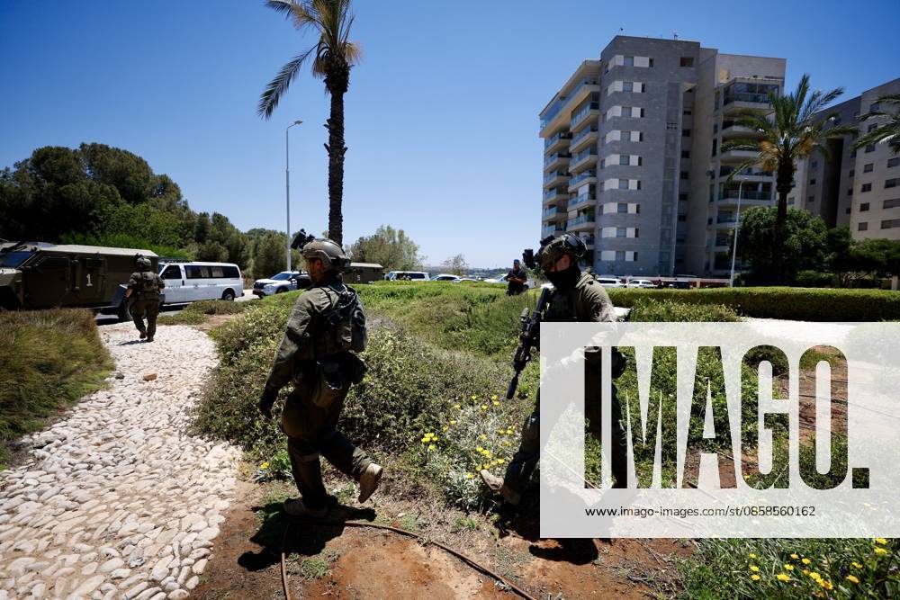 (260607) -- KOCHAV YA IR, June 7, 2026 -- Security personnel work at the scene of a shooting incident in the Kochav Ya ir area of central Israel, June 7, 2026. One person was killed and five others were injured in a shooting in central Israel on Sunday before the suspected attacker was shot, in what Israeli security services described as a terror attack. The shooting occurred at three locations in the Kochav Ya ir area of central Israel, near the border with the West Bank, according to reports. (Photo by Xinhua) ISRAEL-KOCHAV YA IR-SHOOTING INCIDENT JamalxAwad