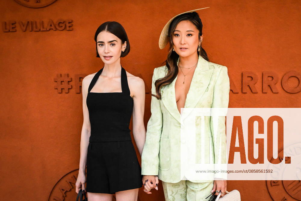 Lily Collins and Ashley Park during the Roland-Garros 2026, French Open 2026, Grand Slam tennis tournament at Roland-Garros Stadium on June 07, 2026 in Paris, France. Paris France - ZUMAm308 20260607_zsp_m308_014