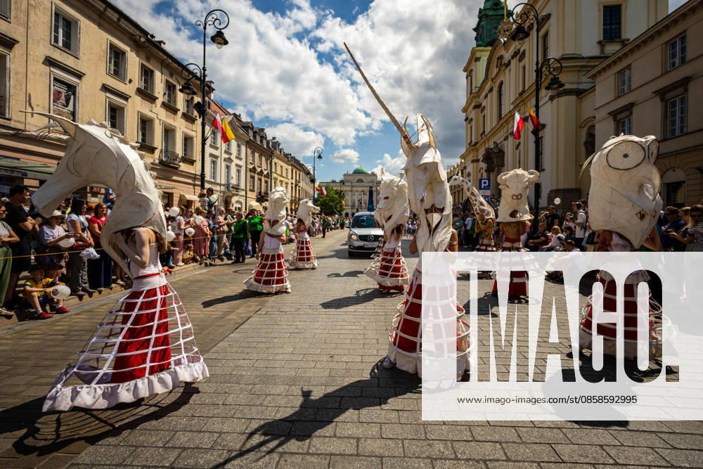 Varsovians enjoy the 5th annual Mermaid Parade in Warsaw - 06 Jun 2026 Performers move with the parade wearing ornate heads of various real and mythical animals. Varsovians took to the streets to enjoy the 5th annual parade of the Mermaids. Celebrating the mermaid, the symbol of the city, the Warsaw districts came together to create a colourful procession of mermaids, bands, acrobats, dancers, and other performers, which moves from the Charles De Gaulle roundabout along the Royal Route to Castle Square. Warsaw Poland