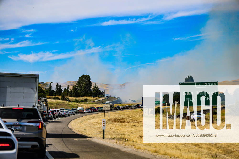 San Miguel Next Right sign and smoke billowing behind it as a A brush fire broke out along Highway 101 and Cemetery Road near the historic San Miguel Mission in San Miguel, California, on the afternoon of June 7, 2026, after a four-vehicle crash. USA - ZUMAk144 20260607_znp_k144_021