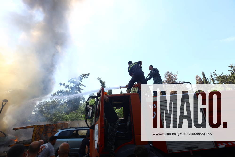 Israeli strikes target southern Lebanon despite ceasefire SIDON, LEBANON - JUNE 10: Firefighters work to extinguish a fire following an Israeli airstrike that targeted a vehicle in the city of Sidon, Lebanon on June 10, 2026. Israeli forces carried out airstrikes on areas in southern Lebanon despite the ceasefire, with a vehicle targeted in Sidon, causing a fire. Mohammad Abushama Anadolu Sidon Lebanon. Editorial use only. Please get in touch for any other usage.