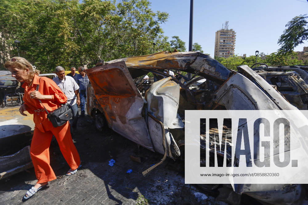 An Israeli drone strike targeted a van in the Al-Bawaba Al-Fawqa area adjacent to the commercial market in central Sidon (Saida), southern Lebanon, killing two people and igniting a fire that spread to several nearby vehicles. The attack occurred near the Maronite Church and a fuel station in a densely populated civilian area. Emergency responders and civil defense teams recovered the victims and worked to extinguish the blaze, which damaged at least four neighboring cars. Saida lebanon - ZUMAb339 20260610_znp_b339_006
