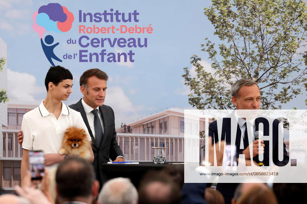 Emmanuel Macron and Brigitte Macron Visit the Robert-Debre Hospital - Paris French President Emmanuel Macron delivers a speech next to Adrien Taquet, Chairman of the Supervisory Board of the Robert-Debre Institute for the Child s Brain and Professor Ghislaine Dehaene during the foundation stone laying ceremony for the Child Brain Institute (ICE - Institut Robert-Debre du Cerveau de l’Enfant) at the Robert-Debre Hospital in Paris, on June 10, 2026. Photo by Stephane Lemouton Pool ABACAPRESS.COM Paris France