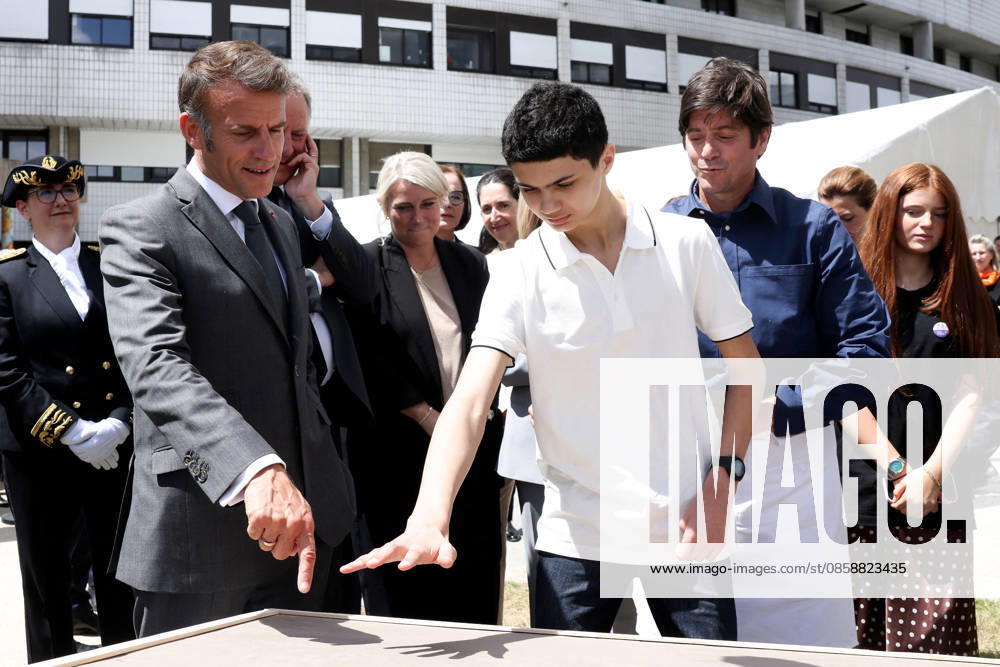 Emmanuel Macron and Brigitte Macron Visit the Robert-Debre Hospital - Paris French President Emmanuel Macron attends a handprint event during the foundation stone laying ceremony for the Child Brain Institute (ICE - Institut Robert-Debre du Cerveau de l’Enfant) at the Robert-Debre Hospital in Paris on June 10, 2026. Photo by Stephane Lemouton Pool ABACAPRESS.COM Paris France