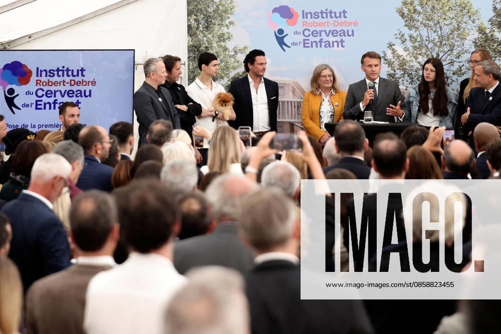 Emmanuel Macron and Brigitte Macron Visit the Robert-Debre Hospital - Paris French President Emmanuel Macron delivers a speech next to Adrien Taquet, Chairman of the Supervisory Board of the Robert-Debre Institute for the Child s Brain and Professor Ghislaine Dehaene during the foundation stone laying ceremony for the Child Brain Institute (ICE - Institut Robert-Debre du Cerveau de l’Enfant) at the Robert-Debre Hospital in Paris, on June 10, 2026. Photo by Stephane Lemouton Pool ABACAPRESS.COM Paris France