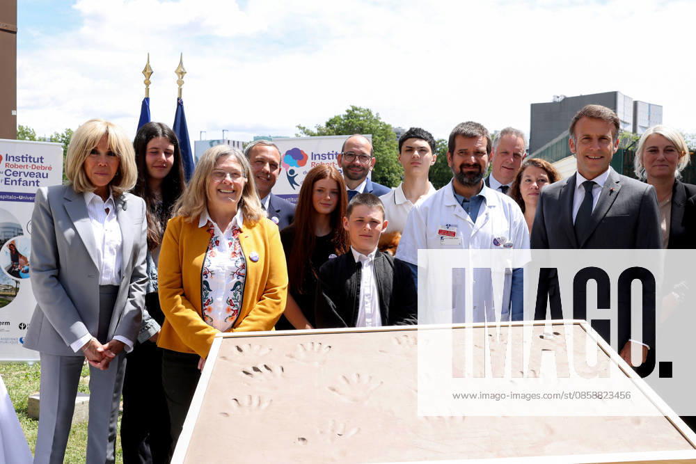Emmanuel Macron and Brigitte Macron Visit the Robert-Debre Hospital - Paris French President Emmanuel Macron and his wife Brigitte Macron attend a handprint event during the foundation stone laying ceremony for the Child Brain Institute (ICE - Institut Robert-Debre du Cerveau de l’Enfant) at the Robert-Debre Hospital in Paris on June 10, 2026. Photo by Stephane Lemouton Pool ABACAPRESS.COM Paris France