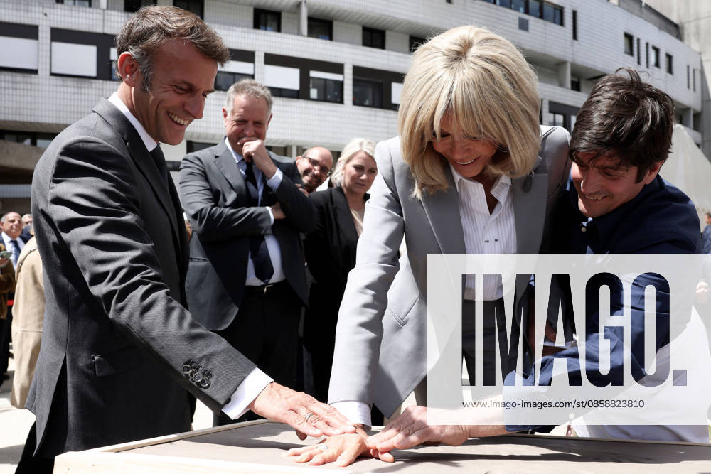 Emmanuel Macron and Brigitte Macron Visit the Robert-Debre Hospital - Paris French President Emmanuel Macron attends a handprint event during the foundation stone laying ceremony for the Child Brain Institute (ICE - Institut Robert-Debre du Cerveau de l’Enfant) at the Robert-Debre Hospital in Paris on June 10, 2026. Photo by Stephane Lemouton Pool ABACAPRESS.COM Paris France